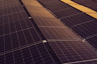 An array of solar panels on a rooftop.